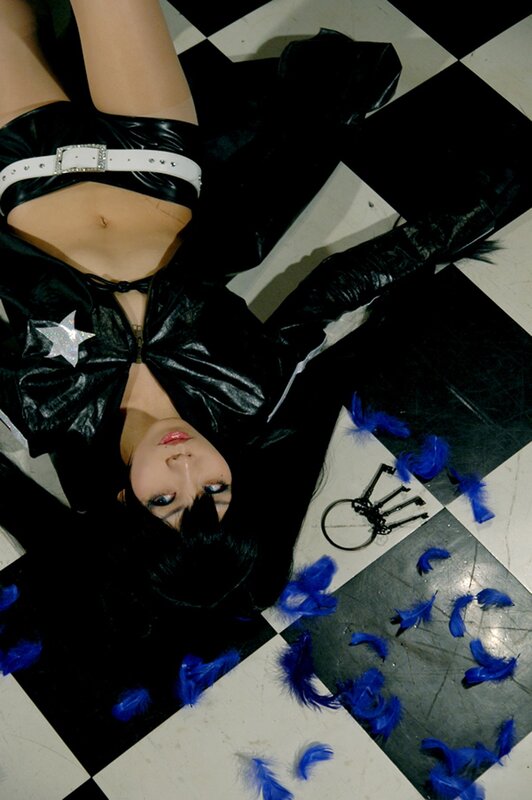cosplayer on checkered floor