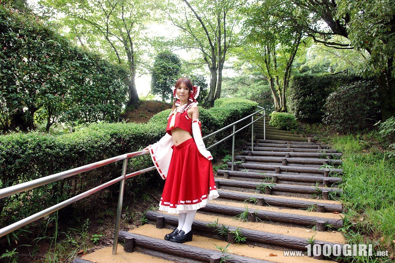 Cosplayer on garden stairs