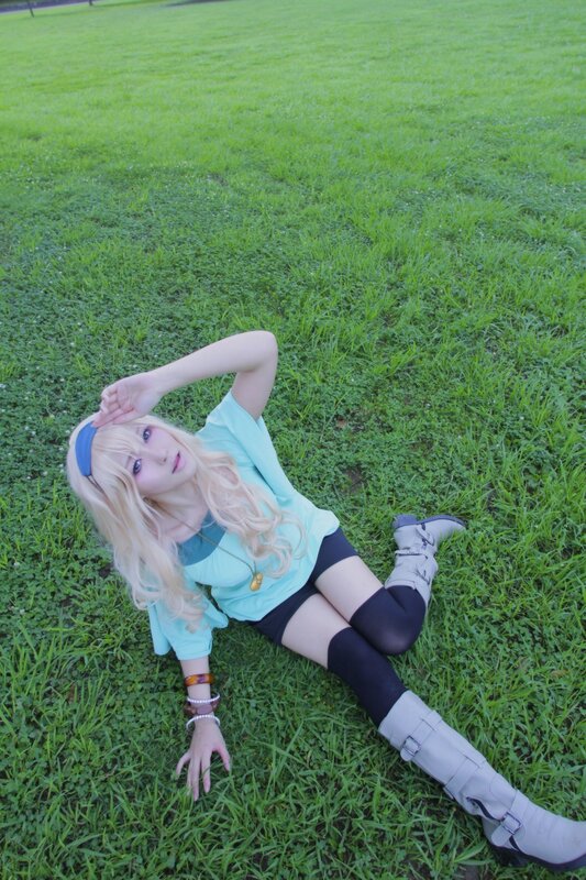 cosplayer on grass field