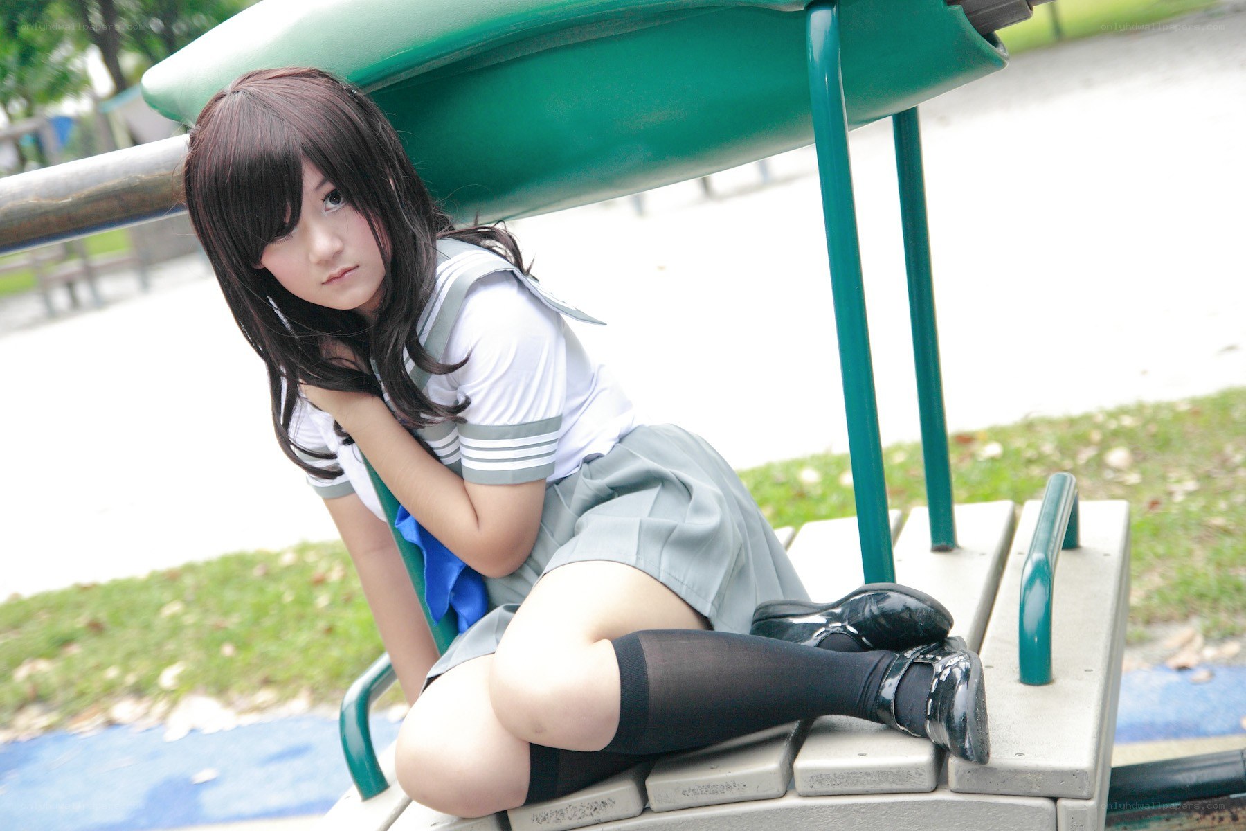 cosplayer on playground structure