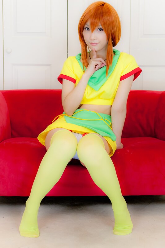 cosplayer on red couch