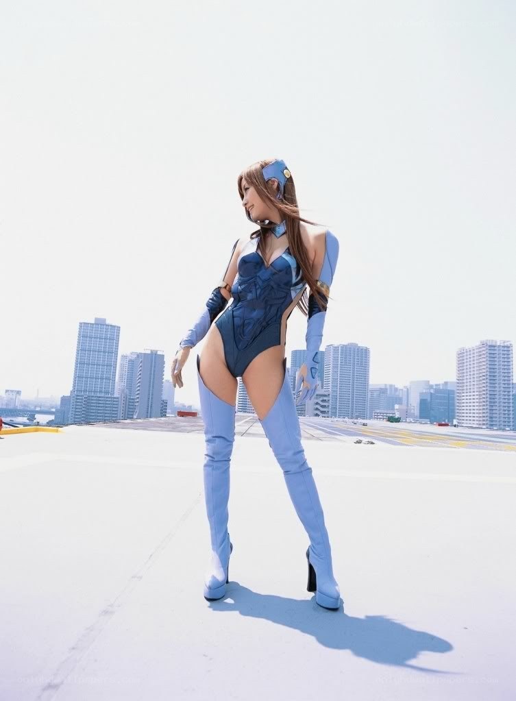 cosplayer on rooftop in blue suit