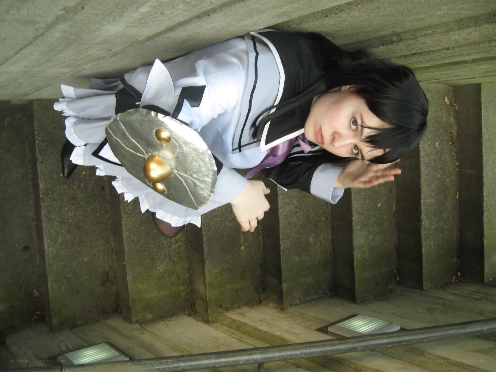 cosplayer on stairs with shield