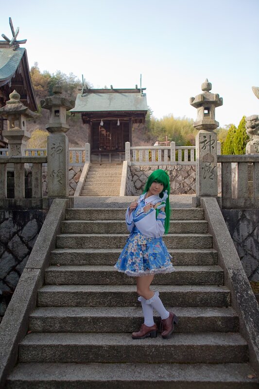 cosplayer on temple stairs