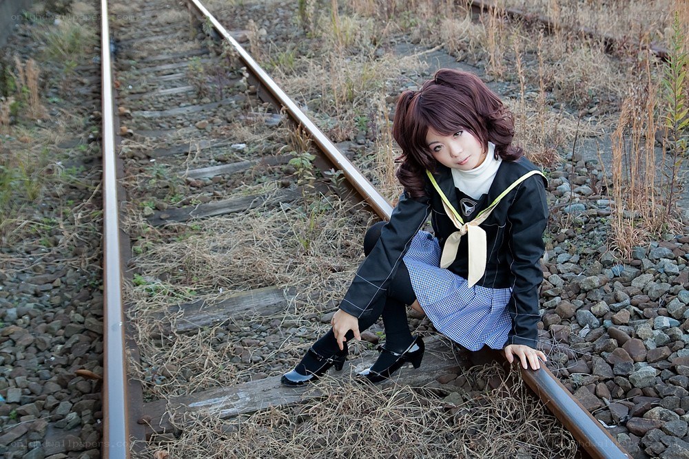 cosplayer on train tracks