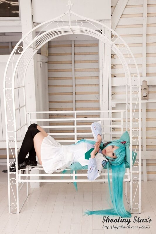 cosplayer on white bench