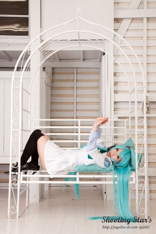 cosplayer on white bench