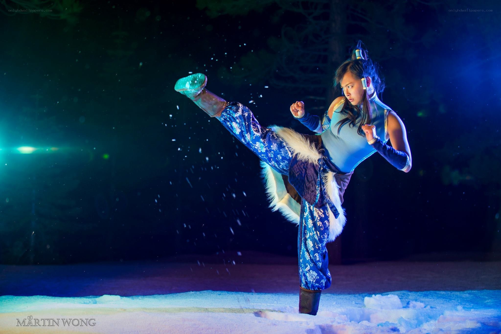 cosplayer performing martial arts kick