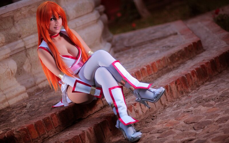 Cosplayer Sitting on Steps — Orange