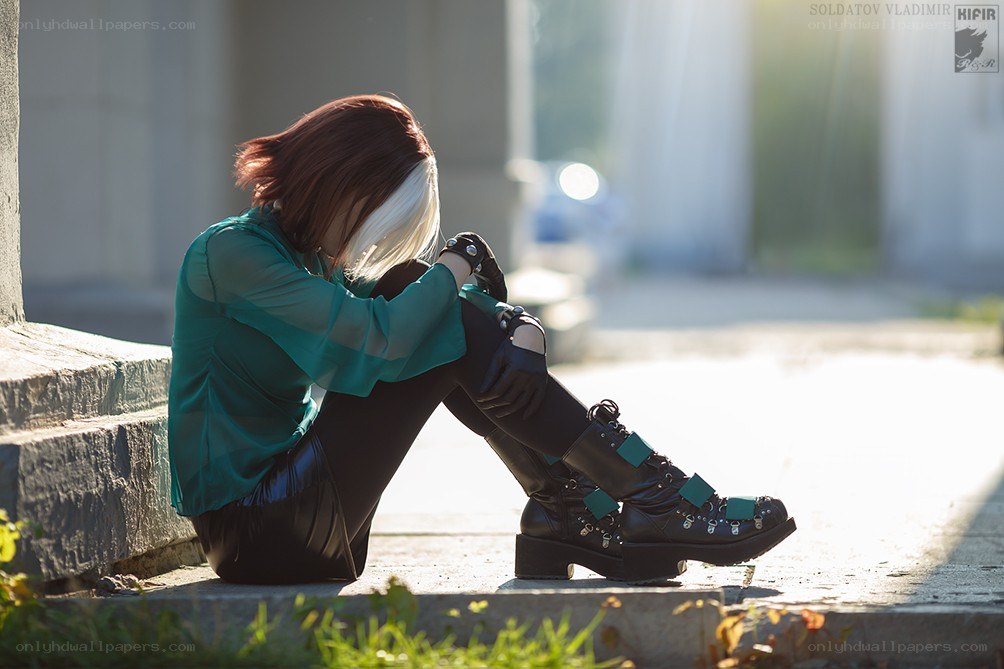cosplayer sitting on steps