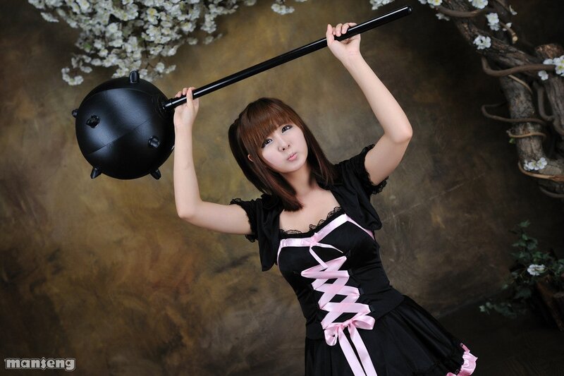 cosplayer with a black mace