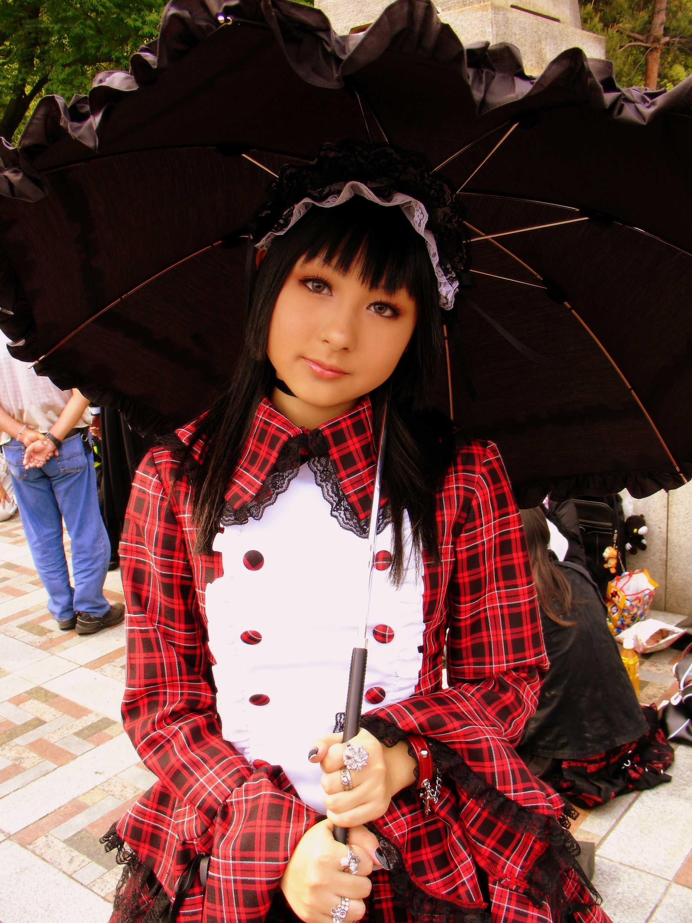 cosplayer with black umbrella