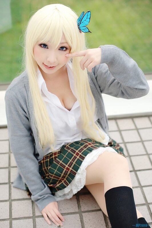 cosplayer with blonde hair and butterfly