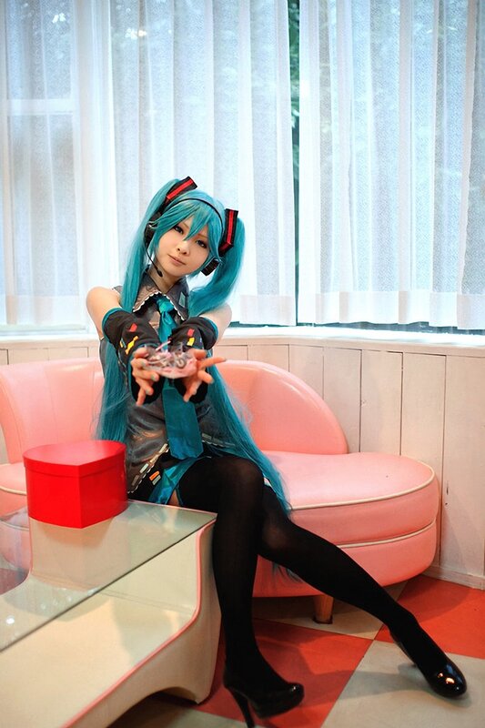Cosplayer with Blue Hair — Calm, Afternoon, Photograph, Pink Couch