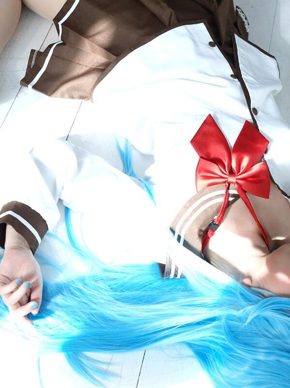 cosplayer with blue hair lying down