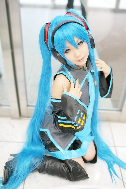 Cosplayer with Blue Hair — Playful, Photograph, Headphones