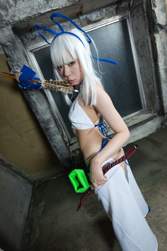 cosplayer with bow and arrows