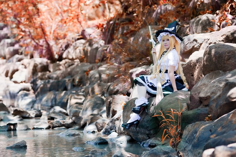 Cosplayer with Broom