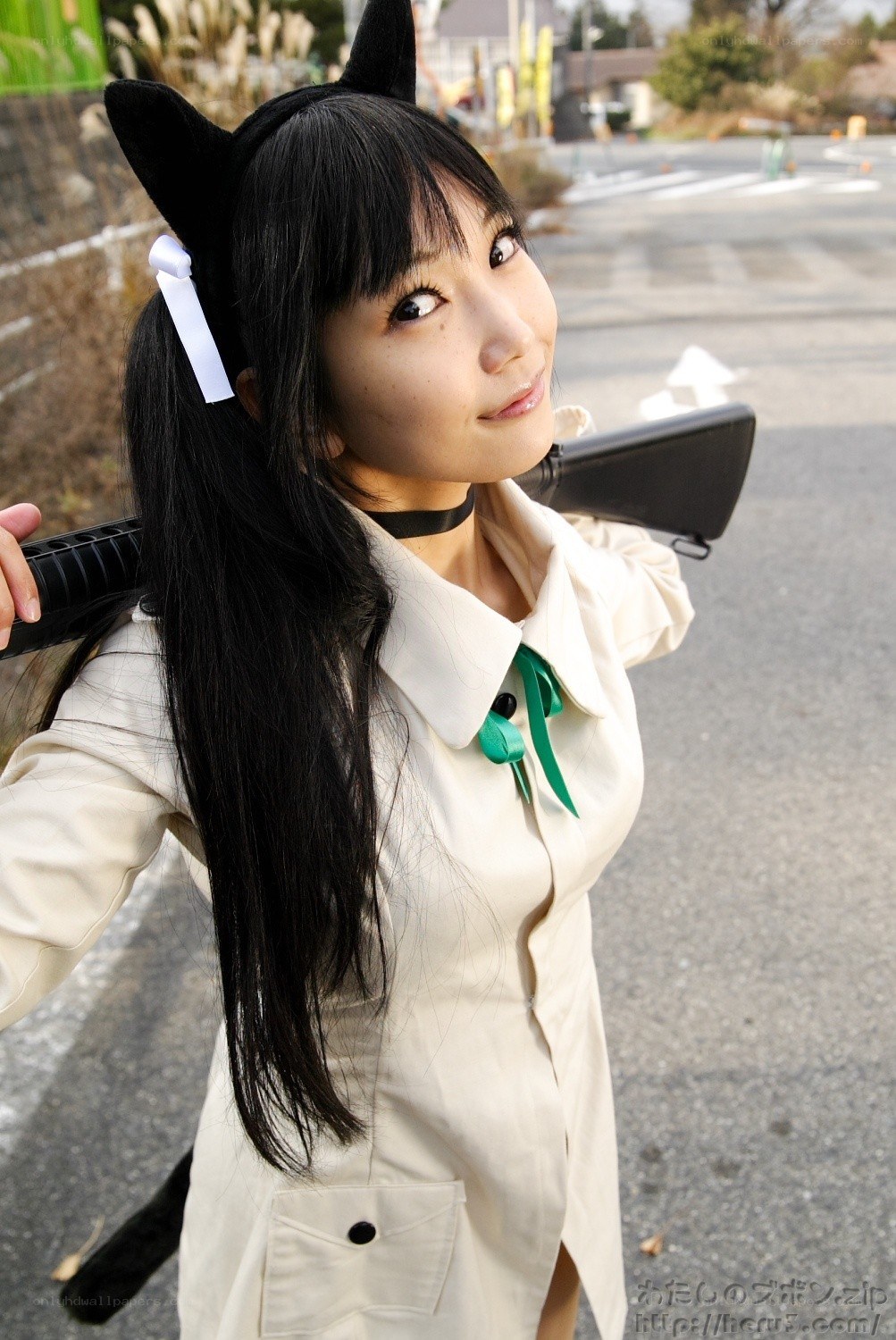 cosplayer with cat ears and rifle