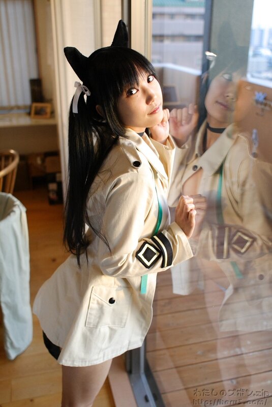 cosplayer with cat ears by window