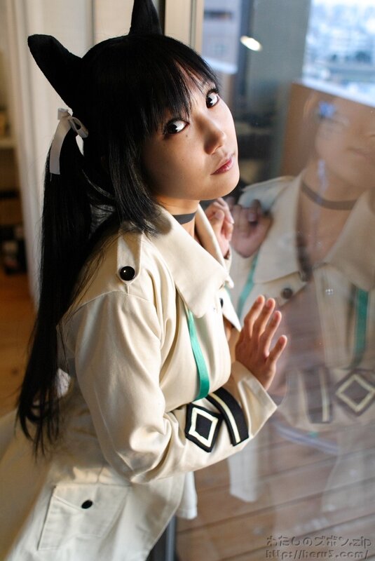 cosplayer with cat ears by window
