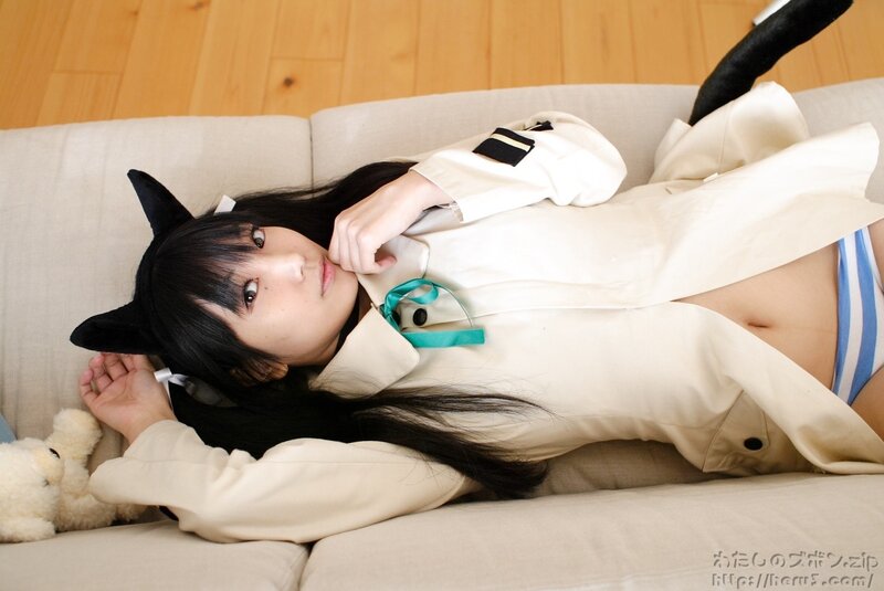 cosplayer with cat ears on couch