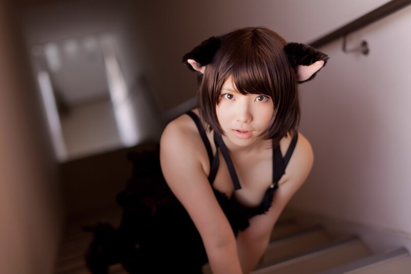 cosplayer with cat ears on stairs