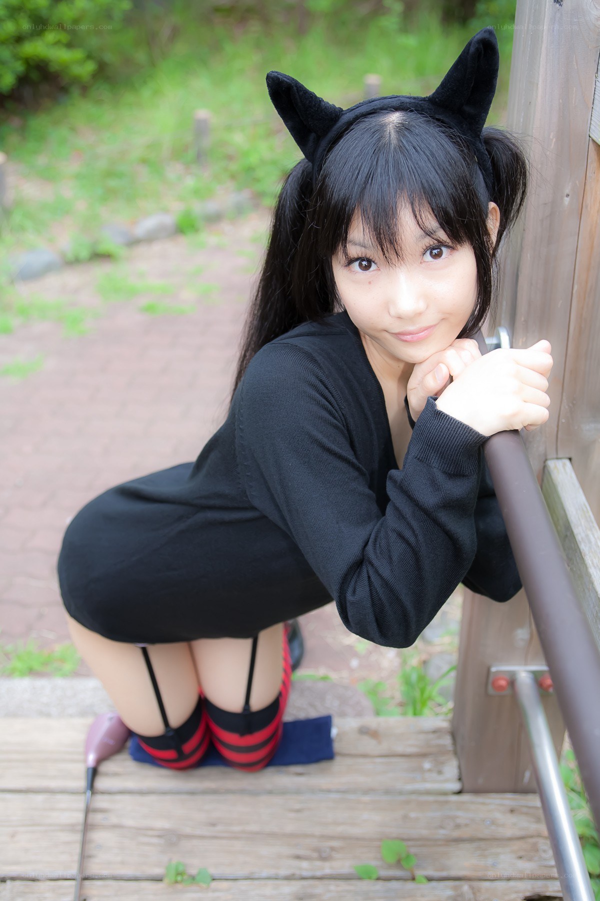 cosplayer with cat ears outdoors