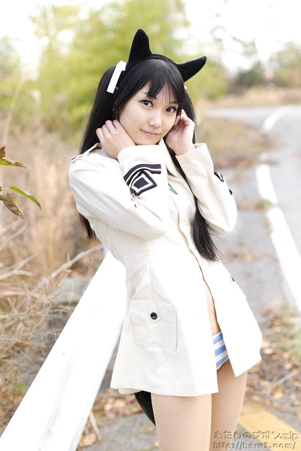 cosplayer with cat ears outdoors