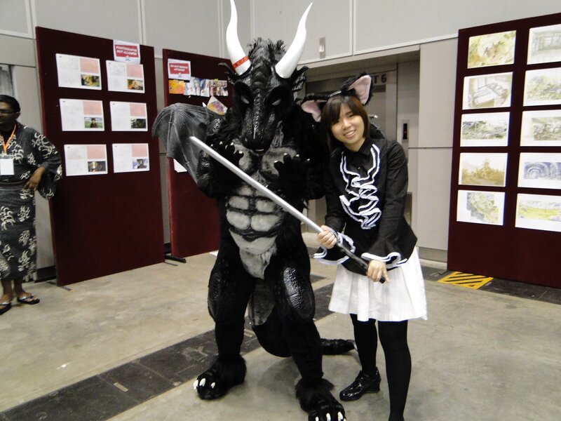 Cosplayer with dragon costume