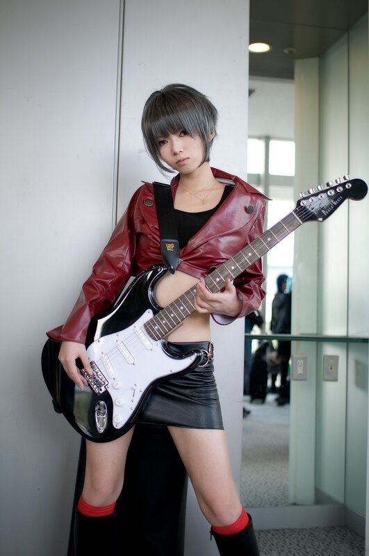cosplayer with electric guitar
