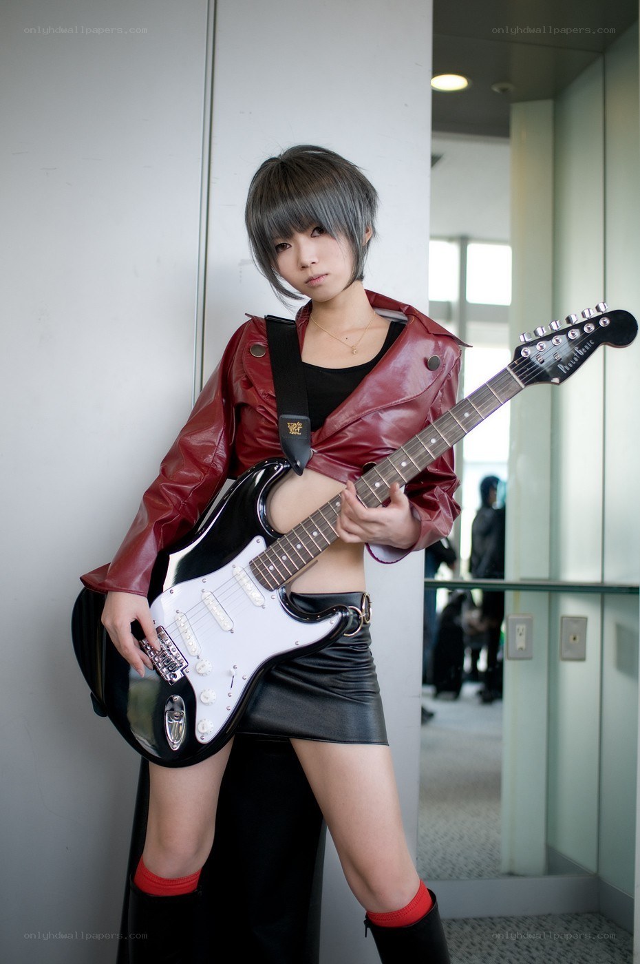 cosplayer with electric guitar