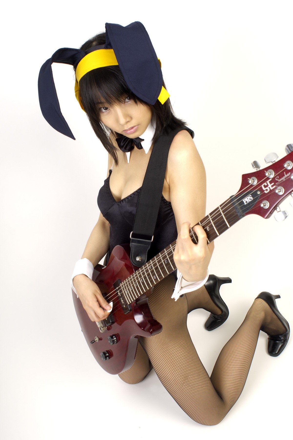 cosplayer with electric guitar