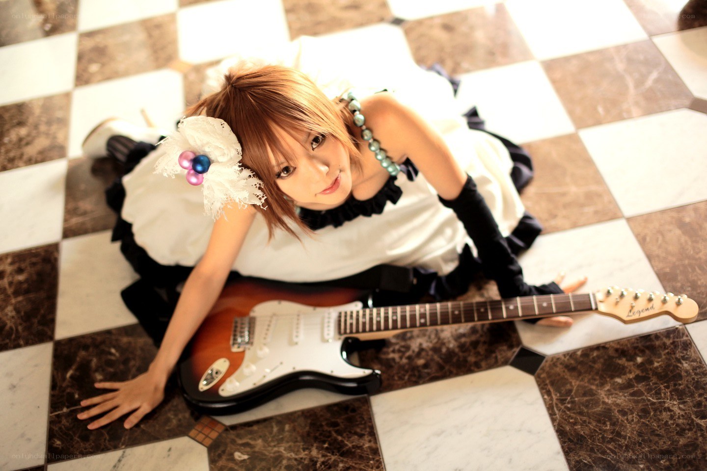 cosplayer with electric guitar