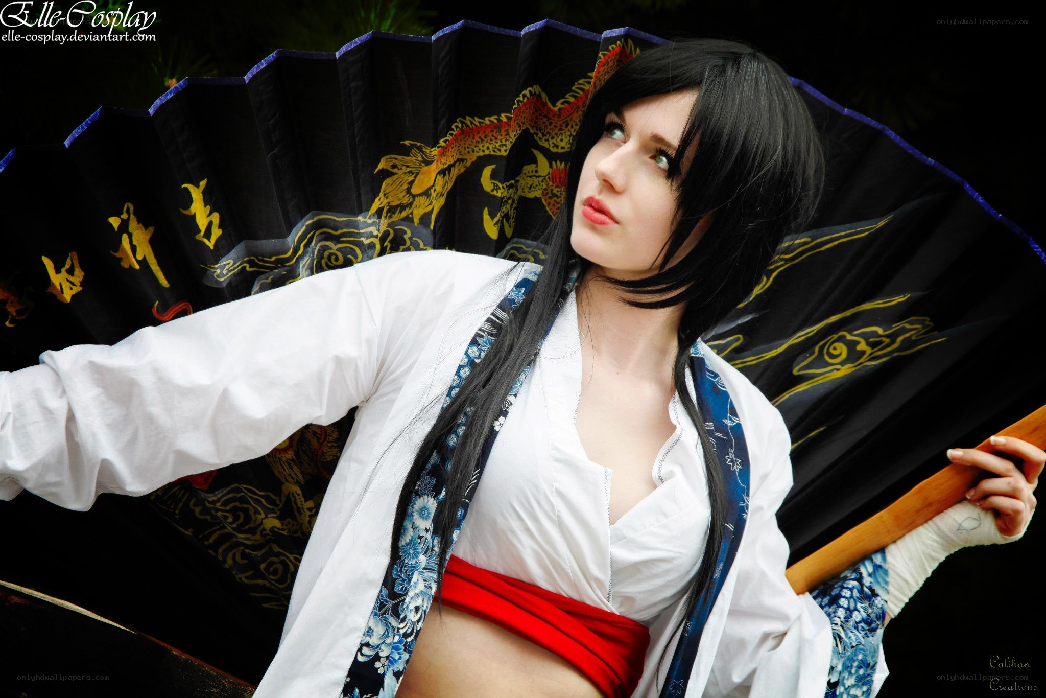 cosplayer with fan and sword