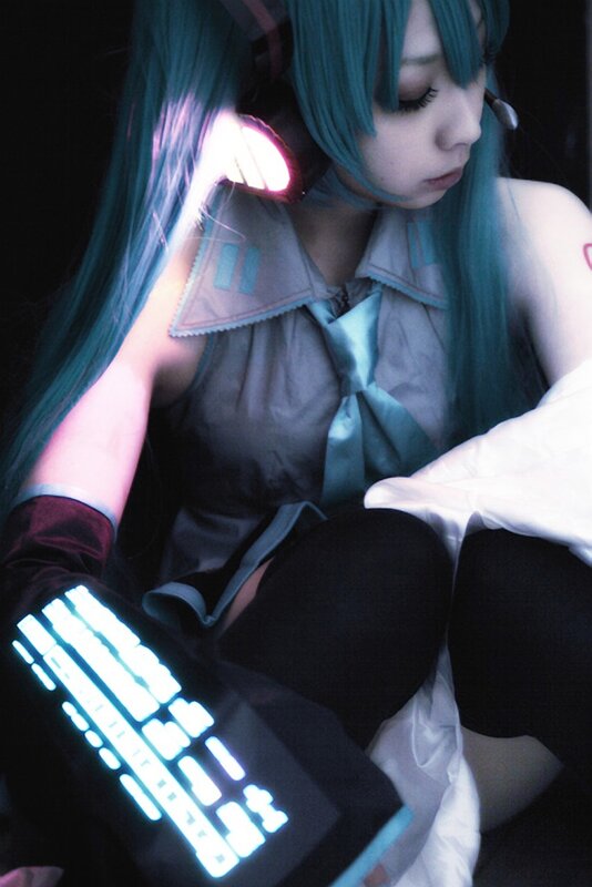 cosplayer with glowing keyboard