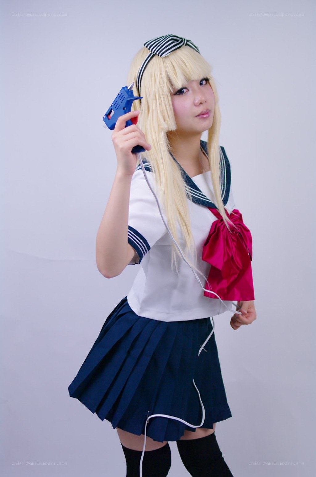 cosplayer with glue gun