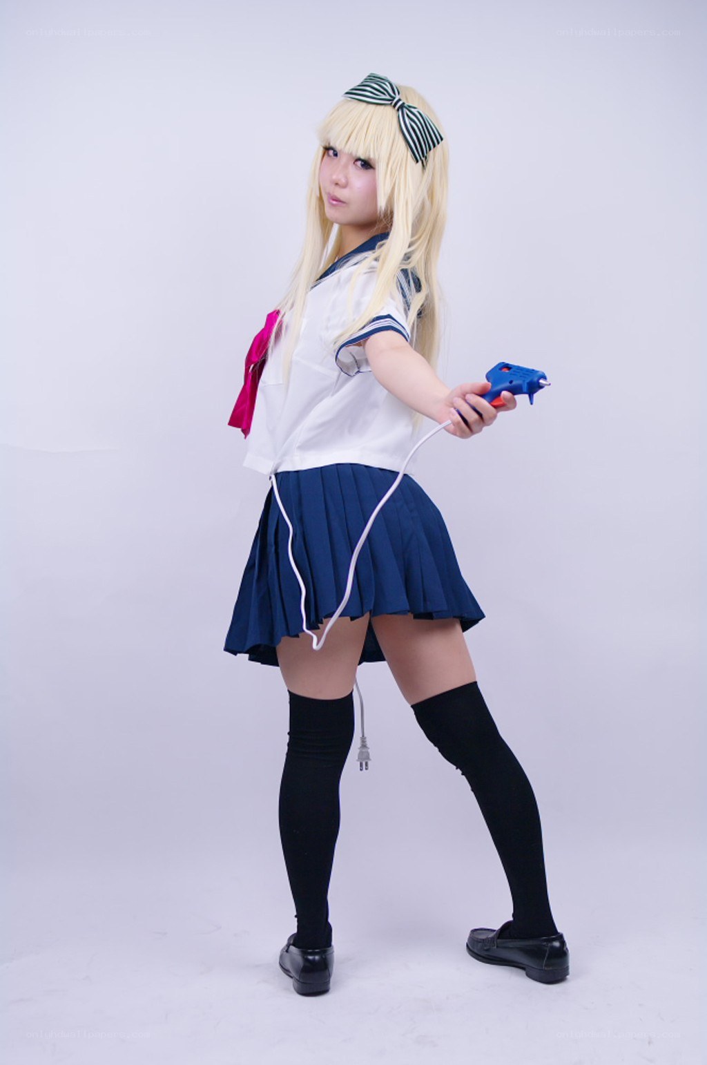 cosplayer with glue gun