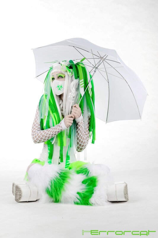 cosplayer with green and white costume