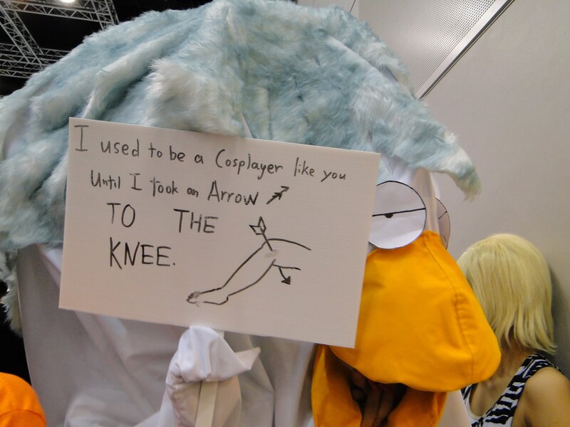 Cosplayer with humorous sign