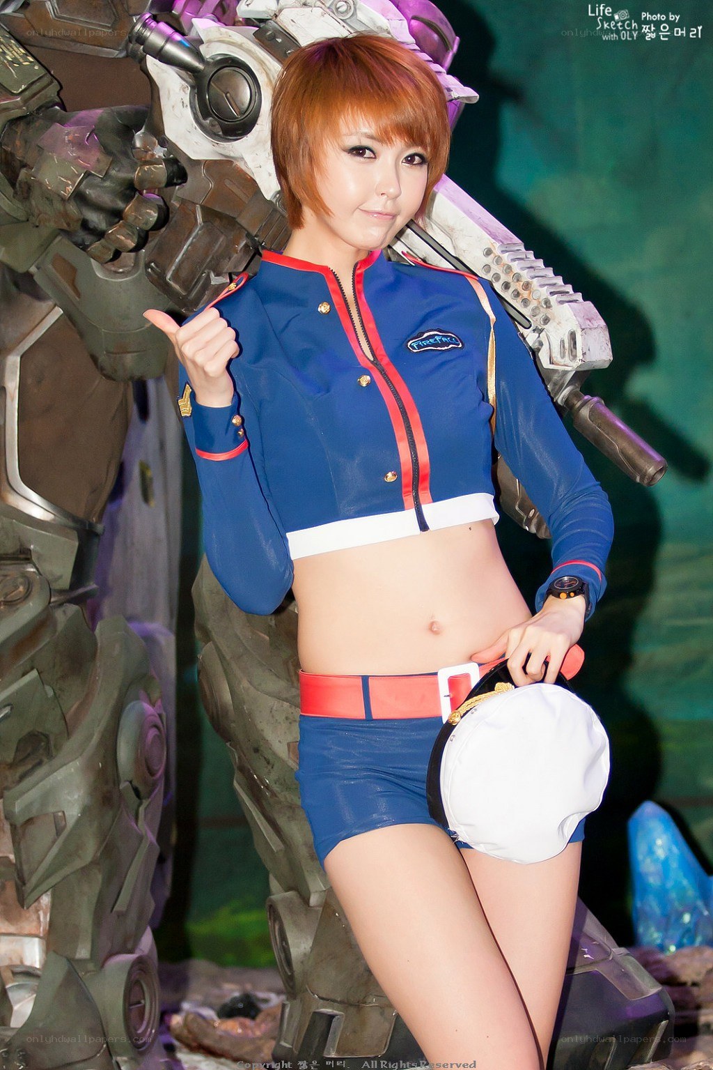 cosplayer with mech backdrop