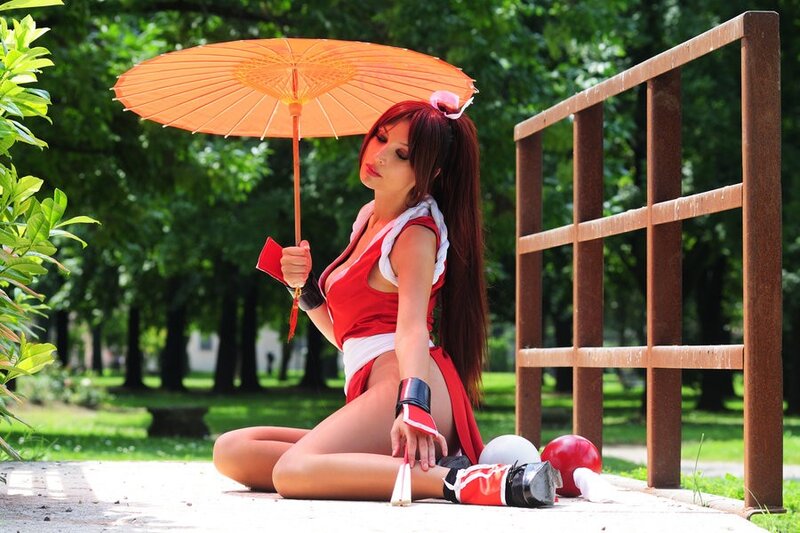 cosplayer with orange umbrella