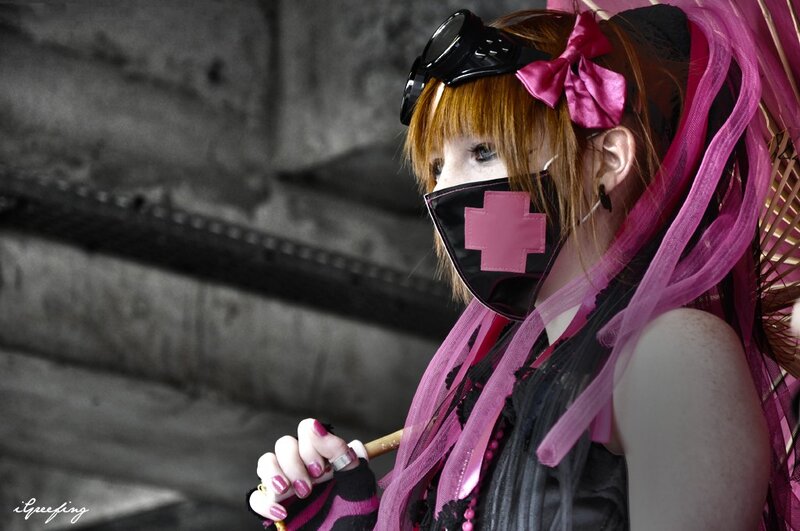 cosplayer with pink accessories