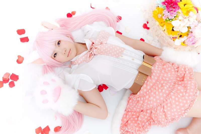 cosplayer with pink hair and bunny ears