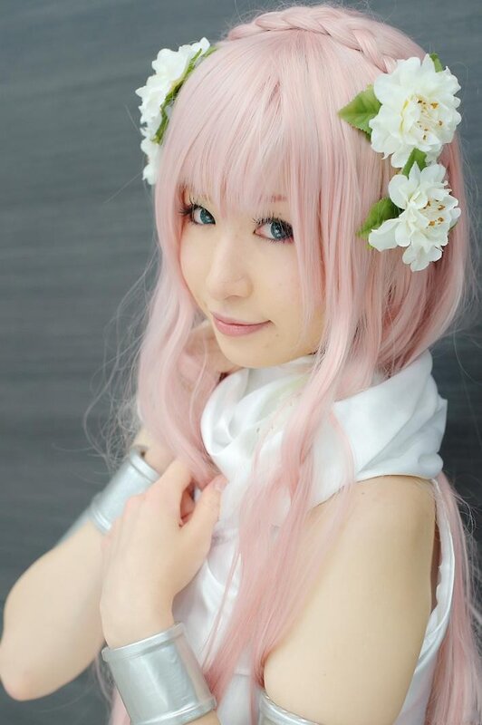 cosplayer with pink hair and flowers