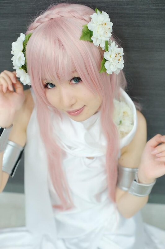 cosplayer with pink hair and flowers