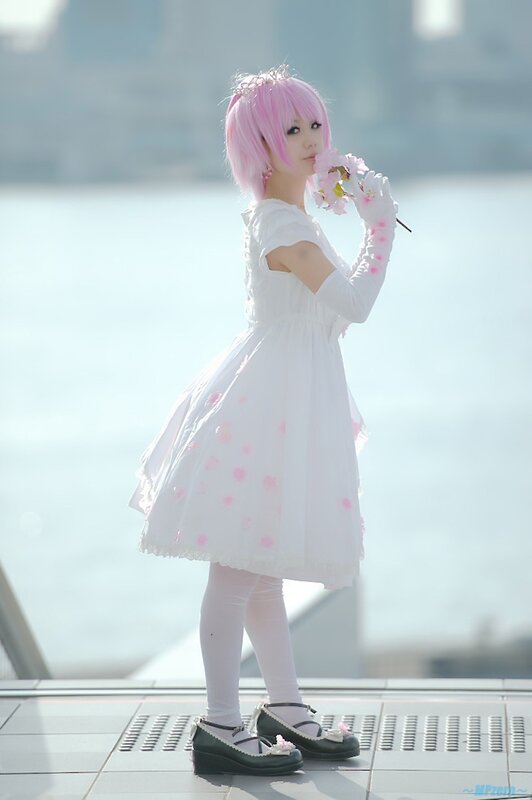 cosplayer with pink hair and flowers
