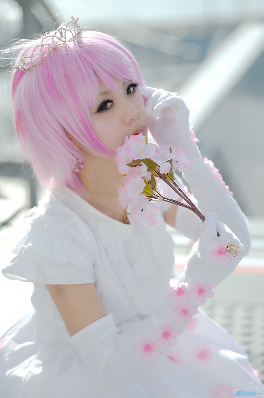 cosplayer with pink hair and flowers