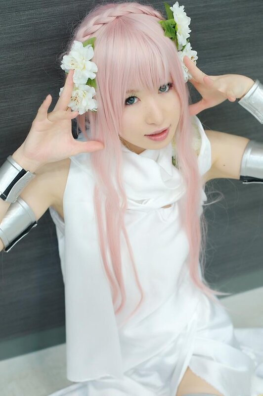 cosplayer with pink hair and flowers