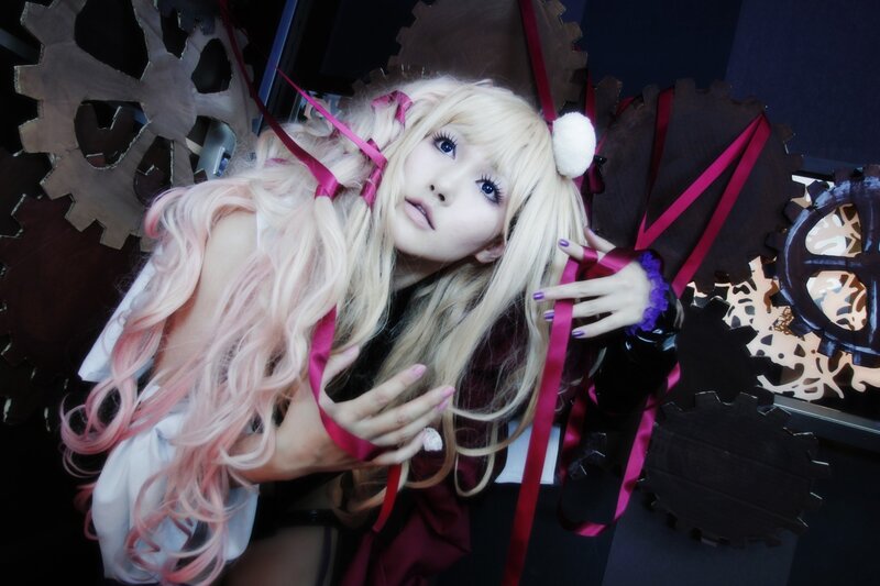 cosplayer with pink ribbons